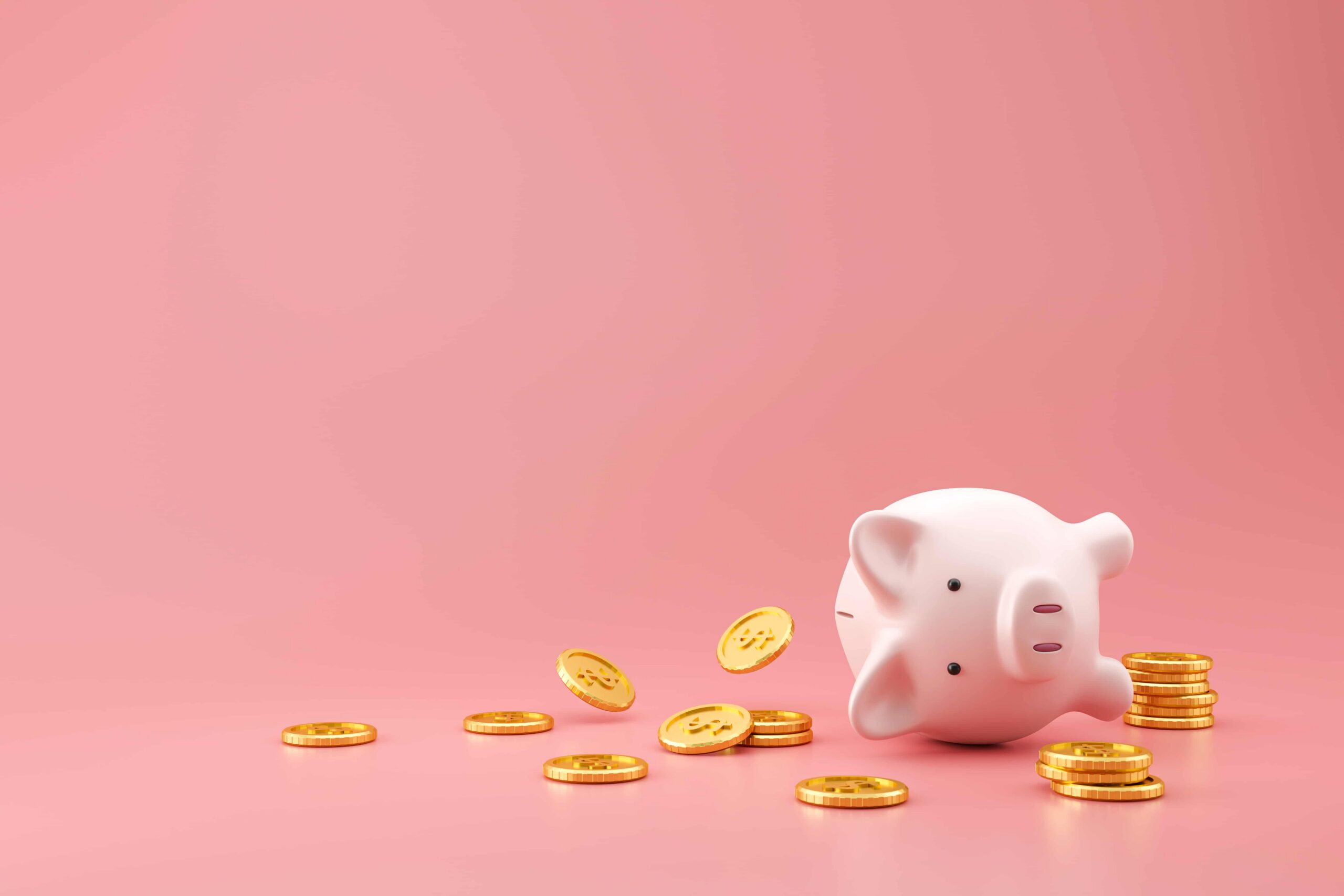 Piggy bank and golden coins on pink background